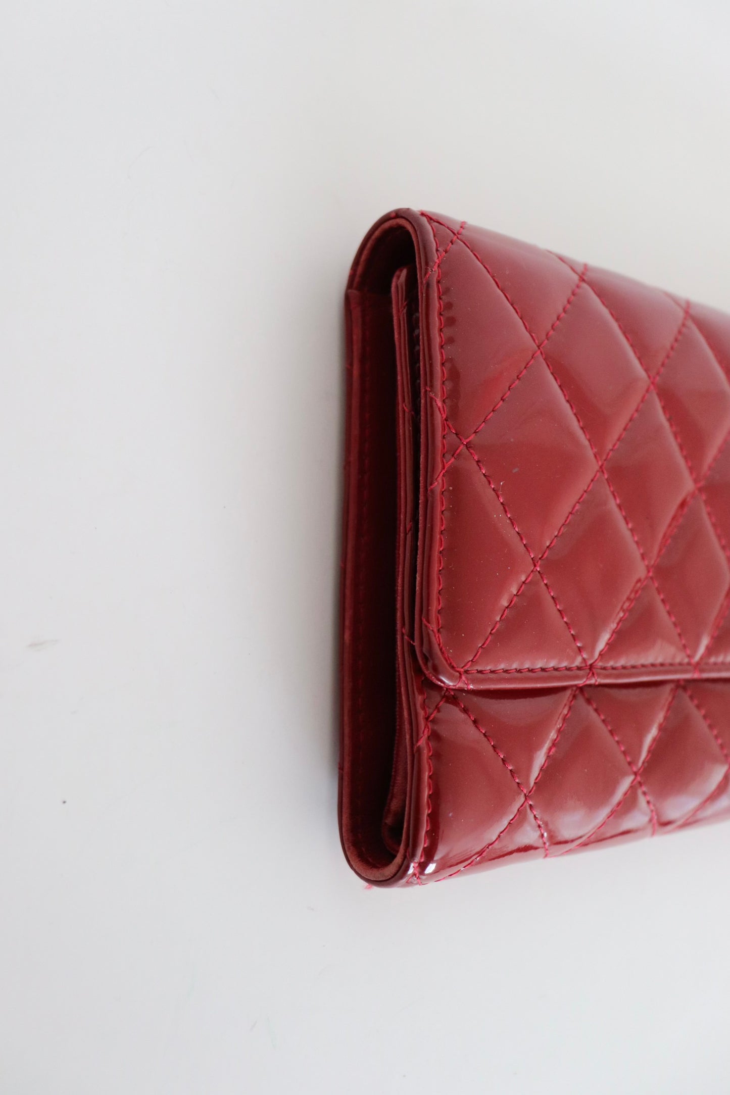 Chanel red quilted patent leather wallet