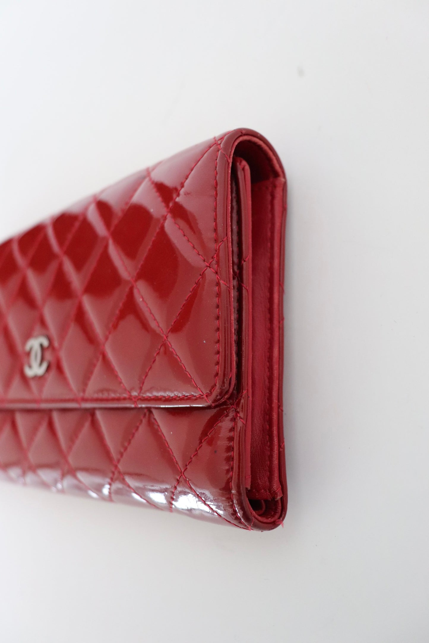 Chanel red quilted patent leather wallet
