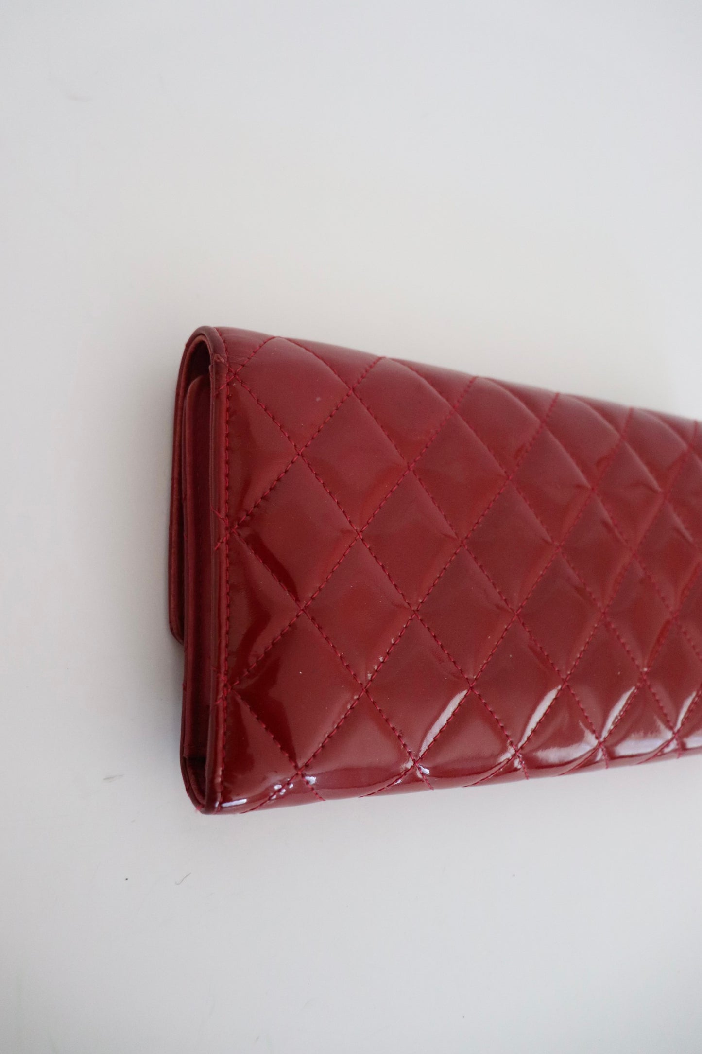 Chanel red quilted patent leather wallet