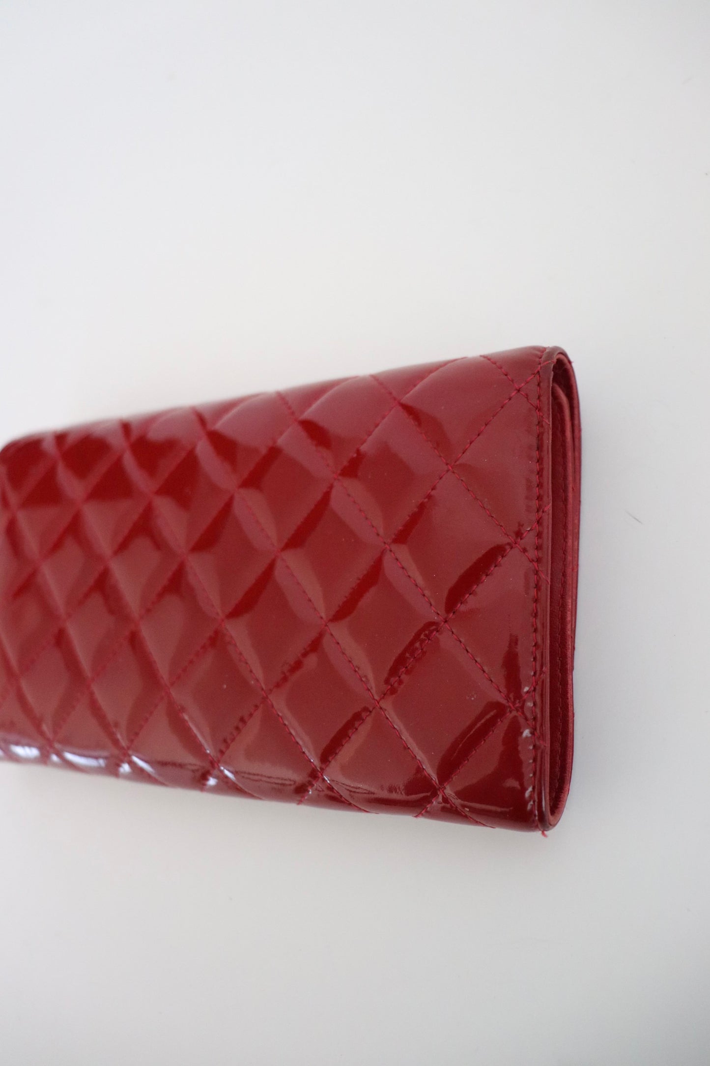 Chanel red quilted patent leather wallet