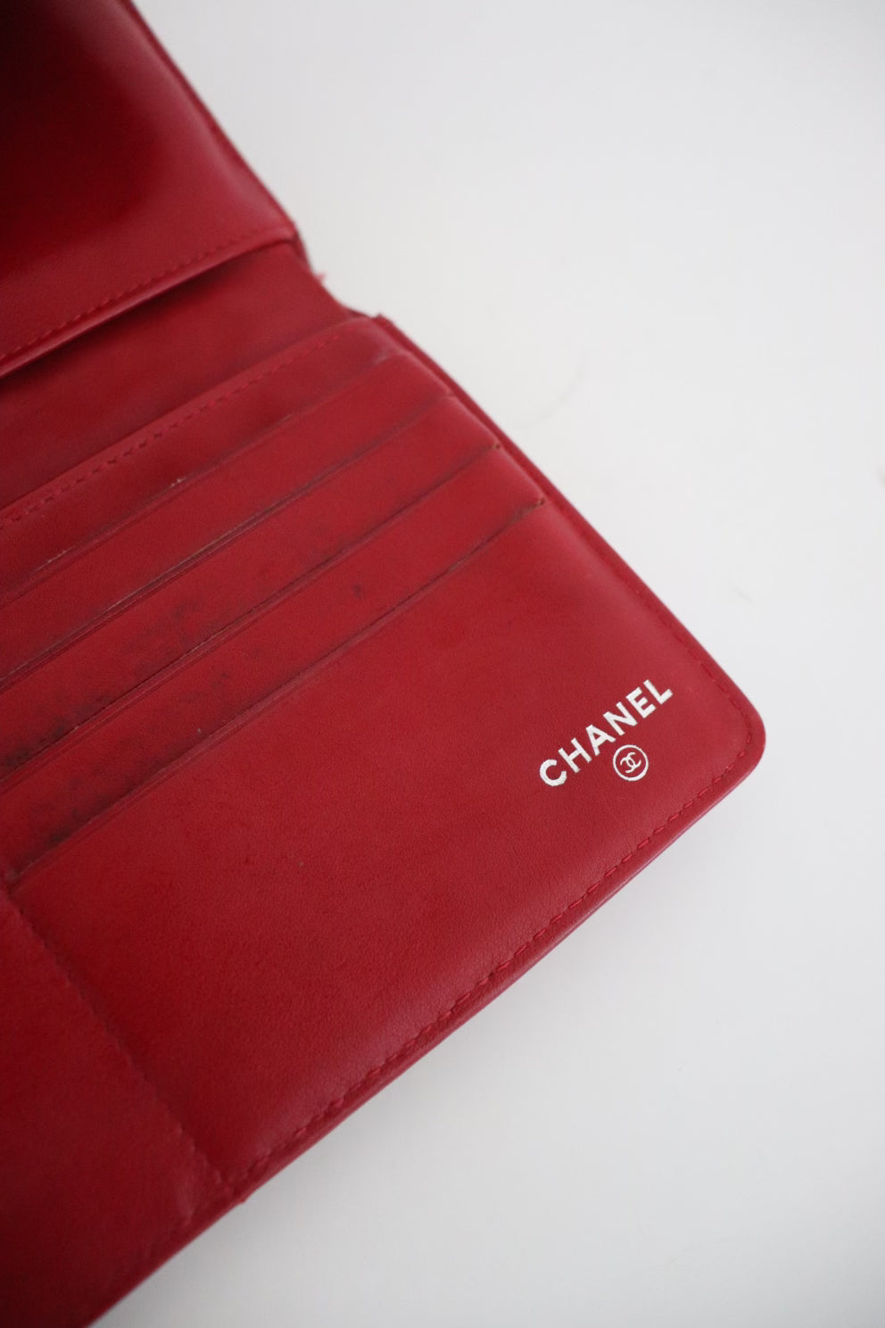 Chanel red quilted patent leather wallet