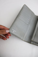 Load image into Gallery viewer, Chanel embossed camellia bifold vintage wallet