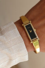 Load image into Gallery viewer, Vintage Gucci Gold Bangle Watch with black dial