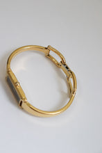 Load image into Gallery viewer, Vintage Gucci Gold Bangle Watch with black dial