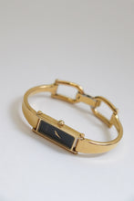 Load image into Gallery viewer, Vintage Gucci Gold Bangle Watch with black dial