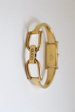 Load image into Gallery viewer, Vintage Gucci Gold Bangle Watch with black dial