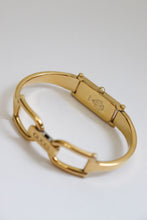 Load image into Gallery viewer, Vintage Gucci Gold Bangle Watch with black dial