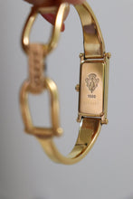 Load image into Gallery viewer, Vintage Gucci Gold Bangle Watch with black dial