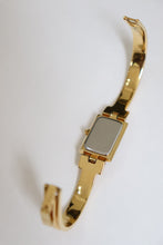 Load image into Gallery viewer, Vintage Givenchy 1990s Black Dial Gold Plated Bangle Watch