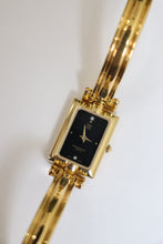 Load image into Gallery viewer, Vintage Givenchy 1990s Black Dial Gold Plated Bangle Watch