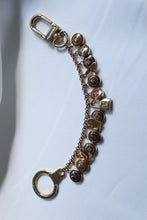 Load image into Gallery viewer, LV fleur de lis in brown