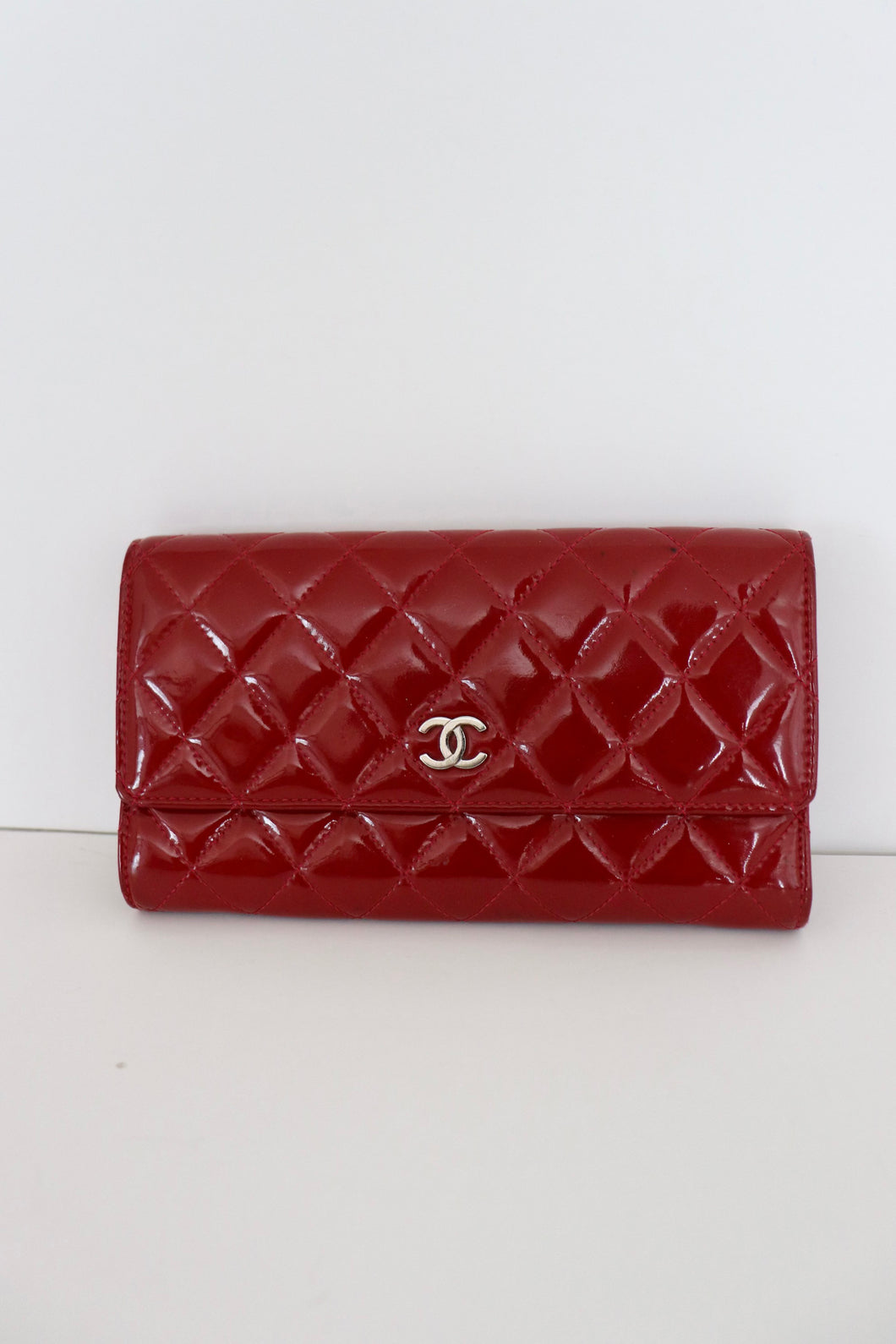 Chanel red quilted patent leather wallet