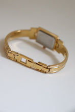 Load image into Gallery viewer, Vintage Givenchy 1990s Blue Dial Gold Plated Bangle Watch
