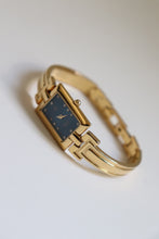 Load image into Gallery viewer, Vintage Givenchy 1990s Blue Dial Gold Plated Bangle Watch
