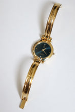 Load image into Gallery viewer, Vintage Givenchy 1990s Blue Dial Gold Plated Bangle Watch

