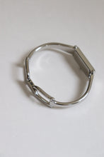Load image into Gallery viewer, Vintage Gucci Bangle Watch in silver with black dial
