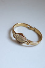 Load image into Gallery viewer, Rare Vintage Givenchy 1990s Gold Round Dial Bangle Watch with crystals
