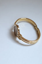 Load image into Gallery viewer, Rare Vintage Givenchy 1990s Gold Round Dial Bangle Watch with crystals
