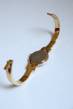 Load image into Gallery viewer, Rare Vintage Givenchy 1990s Gold Round Dial Bangle Watch with crystals
