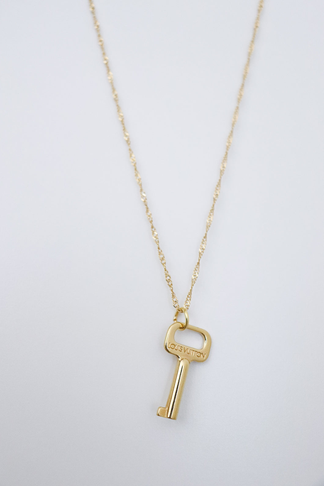 Louis Vuitton key logo