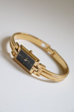 Load image into Gallery viewer, Vintage Givenchy 1990s Black Dial Gold Plated Bangle Watch
