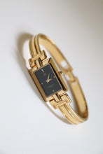 Load image into Gallery viewer, Vintage Givenchy 1990s Black Dial Gold Plated Bangle Watch
