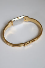 Load image into Gallery viewer, Vintage Givenchy 1990s Black Dial Gold Plated Bangle Watch

