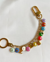 Load image into Gallery viewer, Louis Vuitton mini lock
