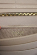 Load image into Gallery viewer, Prada Saffiano metal bar continental flap wallet
