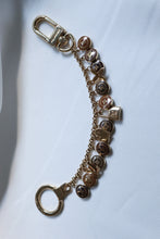 Load image into Gallery viewer, LV logo in brown
