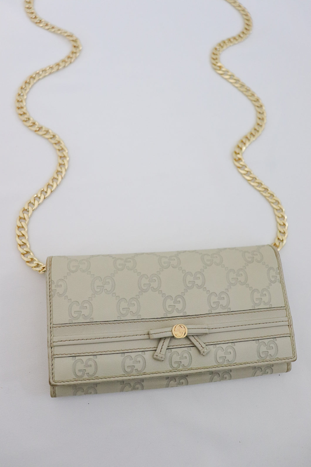 Gucci GG signature ribbon leather wallet